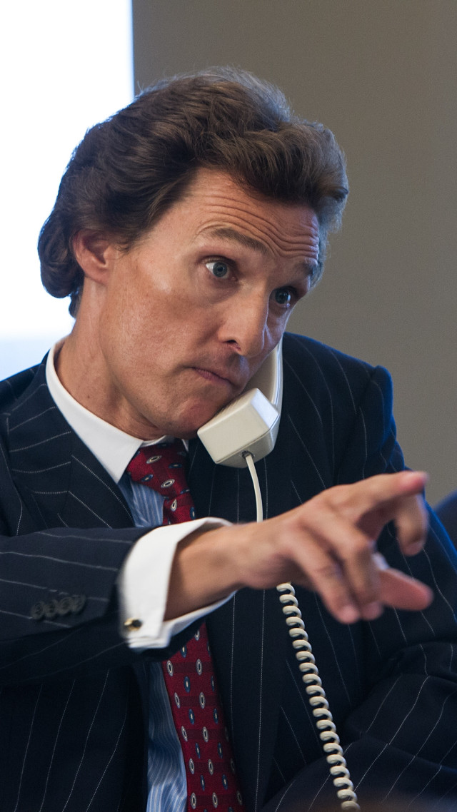 Man suit talking phone holding free wallpaper - medium preview image