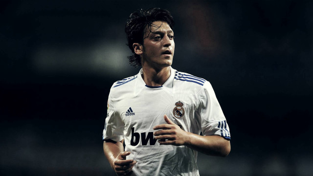Man white uniform running soccer free wallpaper - medium preview image