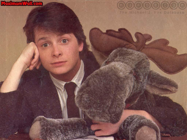 Man holding stuffed animal book free wallpaper - medium preview image