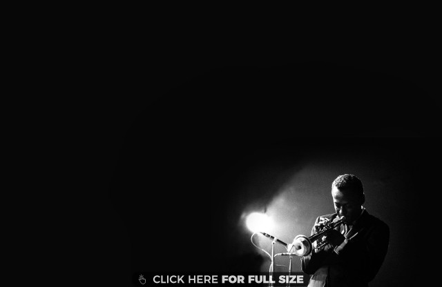 Man playing guitar dark microphone free wallpaper - medium preview image