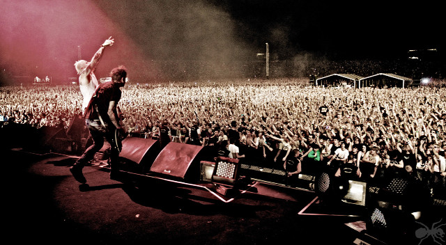 Man stage arms crowd watching free wallpaper - medium preview image