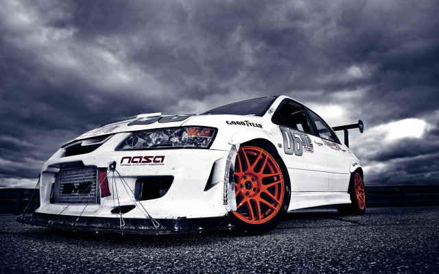 White car orange rims cloudy free wallpaper - medium preview image