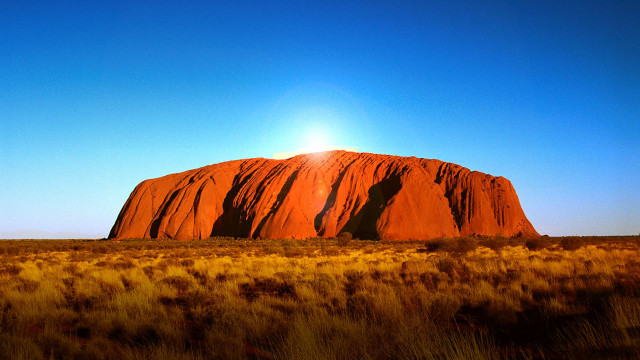 Large rock field sun blue free wallpaper - medium preview image
