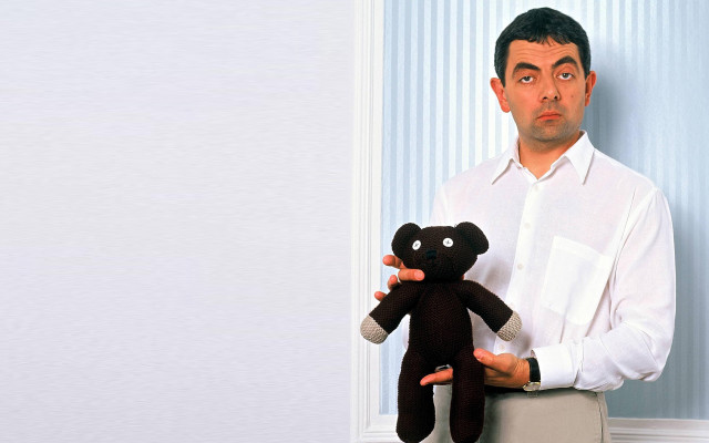 Man holding teddy bear surprised free wallpaper - medium preview image
