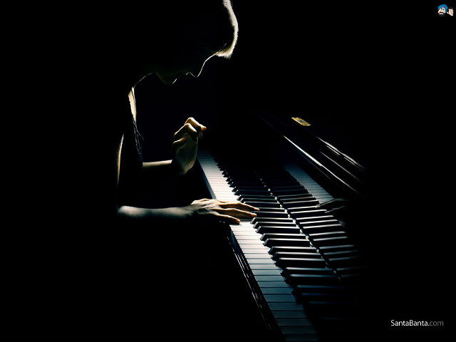Man playing piano dark hands free wallpaper - medium preview image