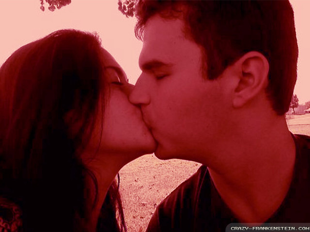 Man woman kissing park red free wallpaper - medium preview image