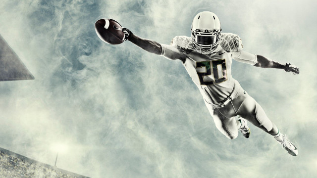 Football player air ball cloudy free wallpaper - medium preview image