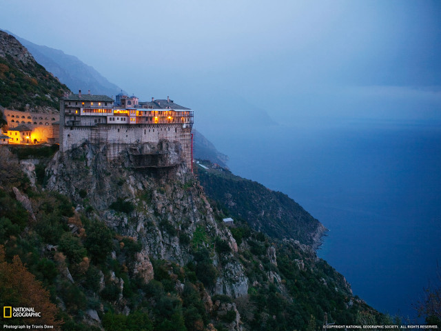 Cliffside building night mountain water free wallpaper - medium preview image