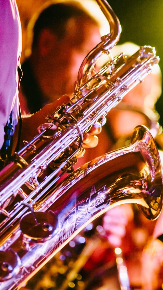 Close up person playing instrument free wallpaper - medium preview image