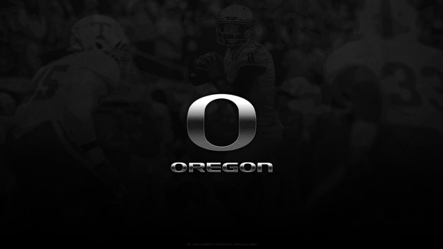 Football player holding ball oregon free wallpaper - medium preview image