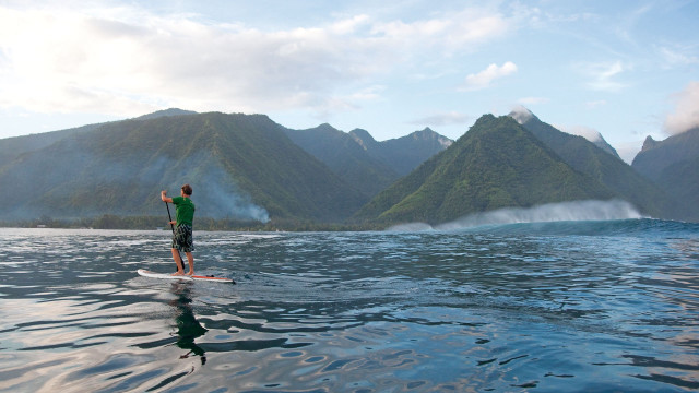 Man surfboard water mountains body free wallpaper - medium preview image