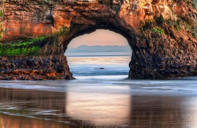 Large rock formation hole beach free wallpaper - medium preview image