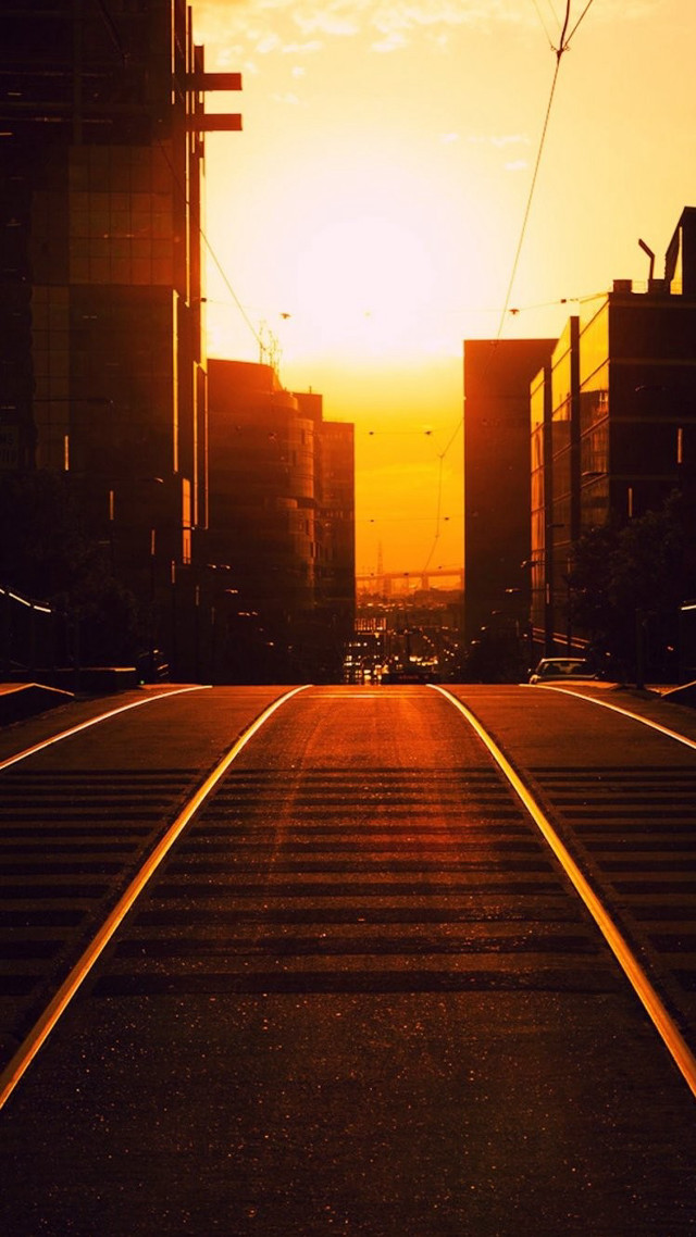 Train track city sunset buildings free wallpaper - medium preview image