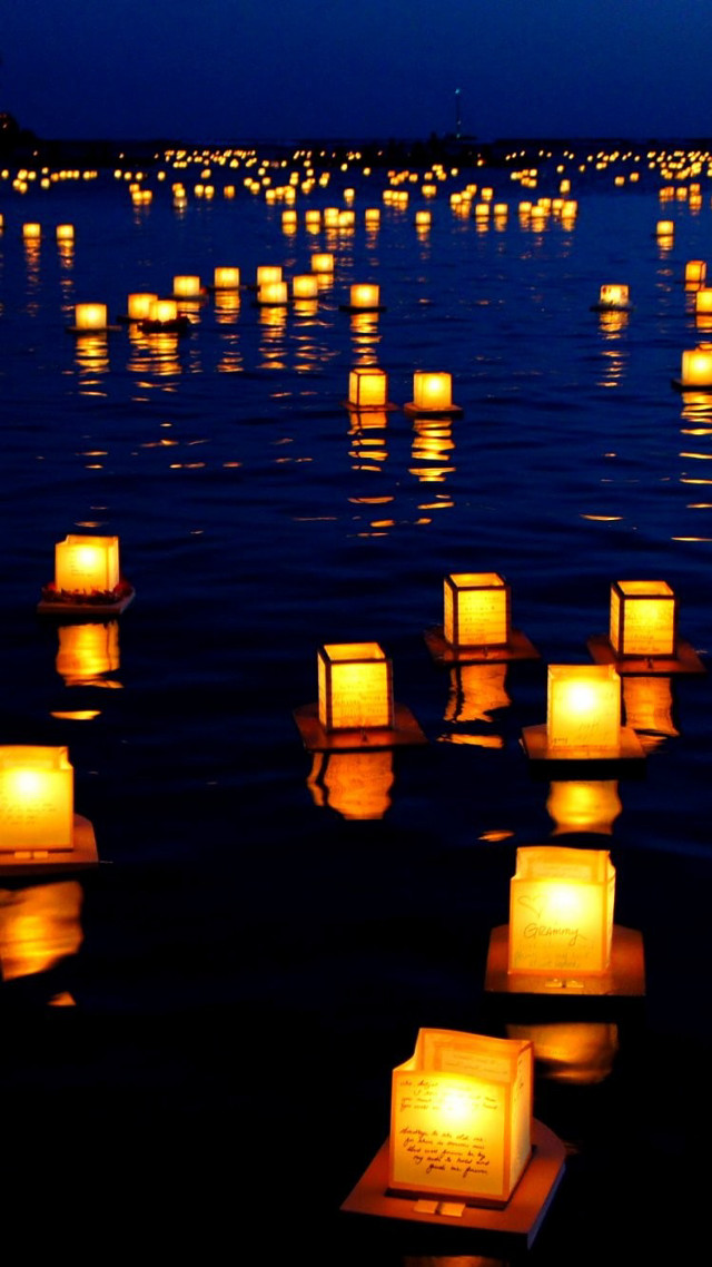 Floating lanterns night water clouds free wallpaper - medium preview image