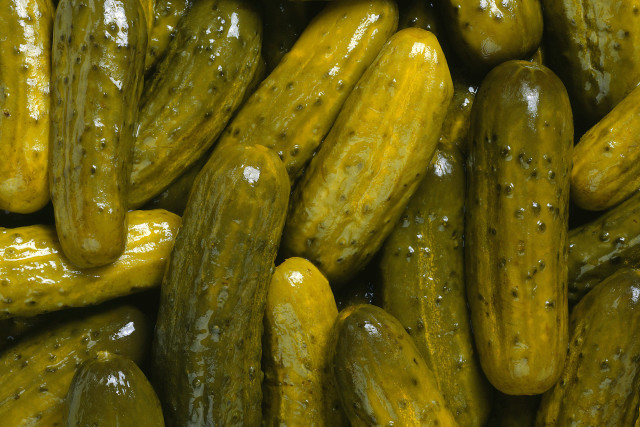 Pile of pickles with water free wallpaper - medium preview image