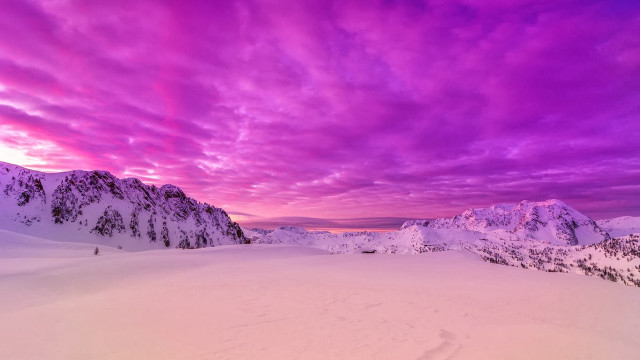 Purple sky snowy mountains skier free wallpaper - medium preview image
