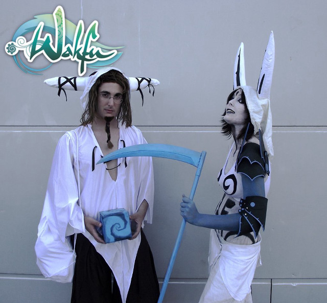 Costumed couple blue object white free wallpaper - medium preview image