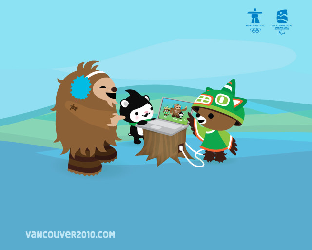 Bear cub playing computer tree free wallpaper - medium preview image