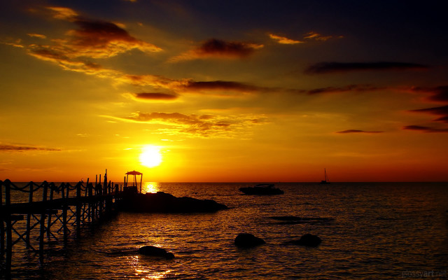 Sunset water pier boats clouds free wallpaper - medium preview image