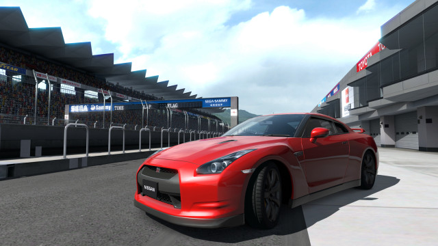 Red sports car racing track #2 free wallpaper - medium preview image