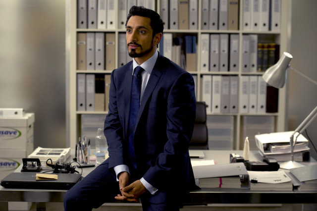 Man suit sitting desk bookcase free wallpaper - medium preview image