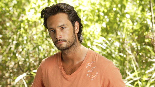 Man orange shirt tree line free wallpaper - medium preview image