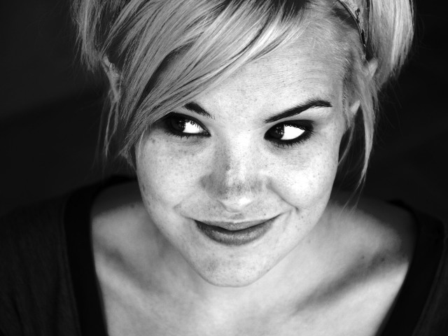 Woman messy bun black eyes free wallpaper - medium preview image