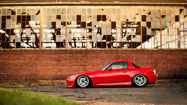 Red sports car broken window free wallpaper - medium preview image