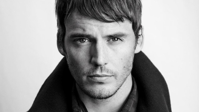 Man scarf serious looking camera free wallpaper - medium preview image