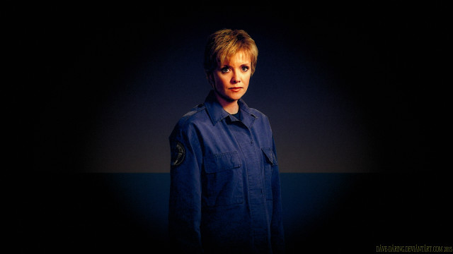 Woman blue shirt dark hands free wallpaper - medium preview image