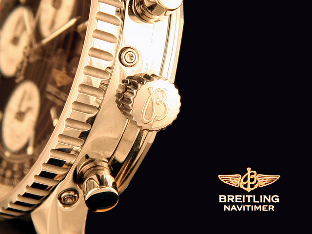 Gold watch closeup black background free wallpaper - medium preview image