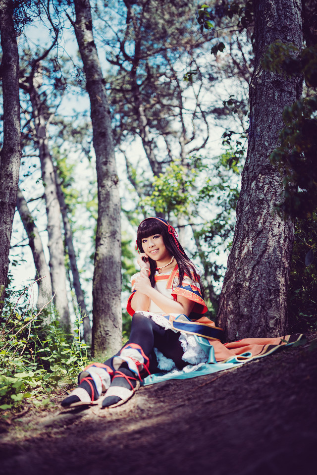 Woman sitting blanket woods trees free wallpaper - medium preview image