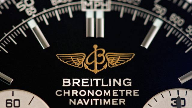 Watch gold lettering tiltshift portrait free wallpaper - medium preview image