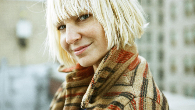 Blonde woman plaid coat smiling free wallpaper - medium preview image