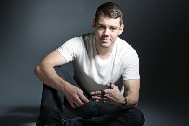 Man sitting floor hands on #2 free wallpaper - medium preview image