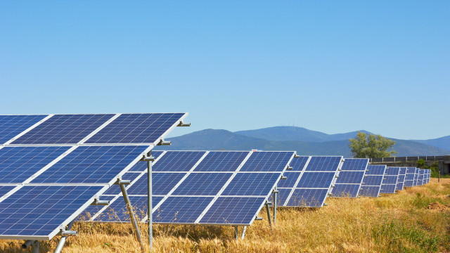 Solar panels mountains blue sky free wallpaper - medium preview image