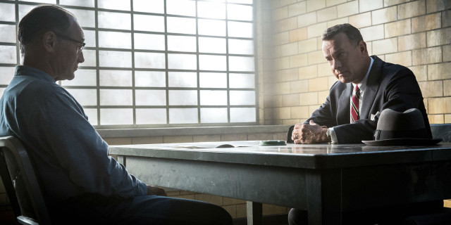 Two men sitting table room free wallpaper - medium preview image