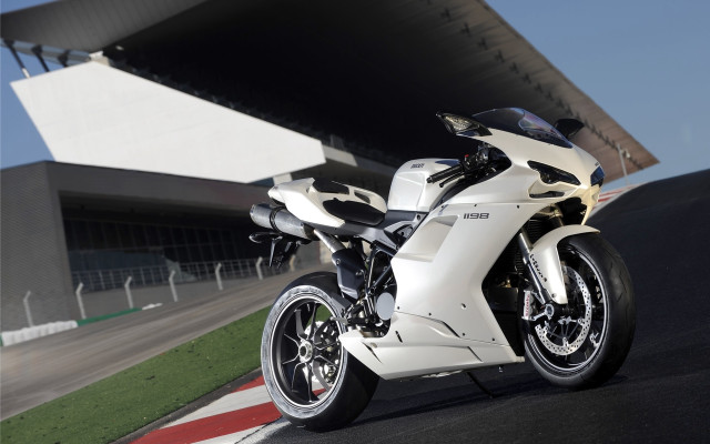White motorcycle race track building free wallpaper - medium preview image