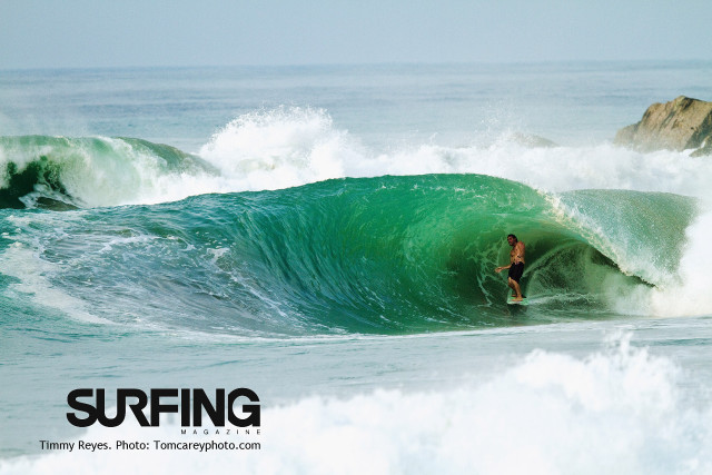 Surfing ocean rock beach sky free wallpaper - medium preview image