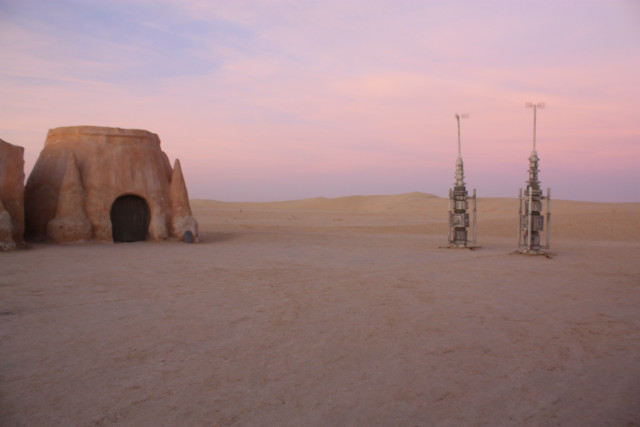 Desert small structure pink sky free wallpaper - medium preview image