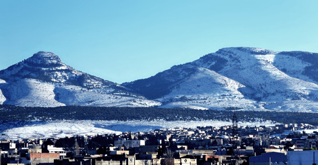 City mountains snow ground foreground free wallpaper - medium preview image