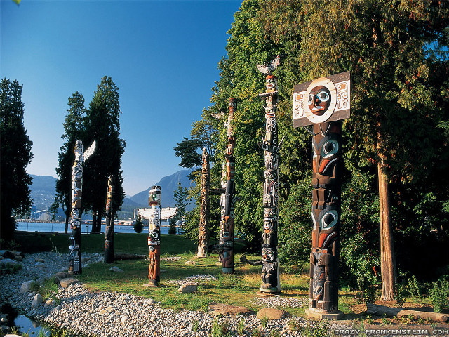 Totem poles park trees lake free wallpaper - medium preview image