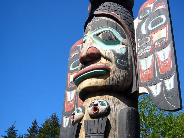 Totem statue blue sky trees free wallpaper - medium preview image