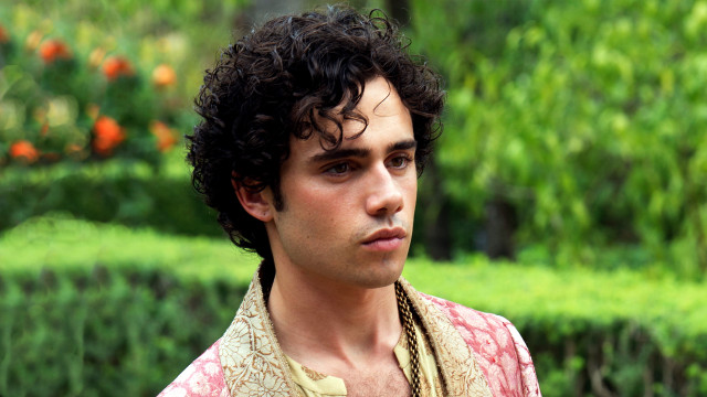 Curly haired man flower shirt free wallpaper - medium preview image