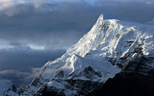 Snowy mountain cloudy sky plane free wallpaper - medium preview image