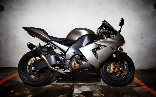 Silver motorcycle parked parking space free wallpaper - medium preview image