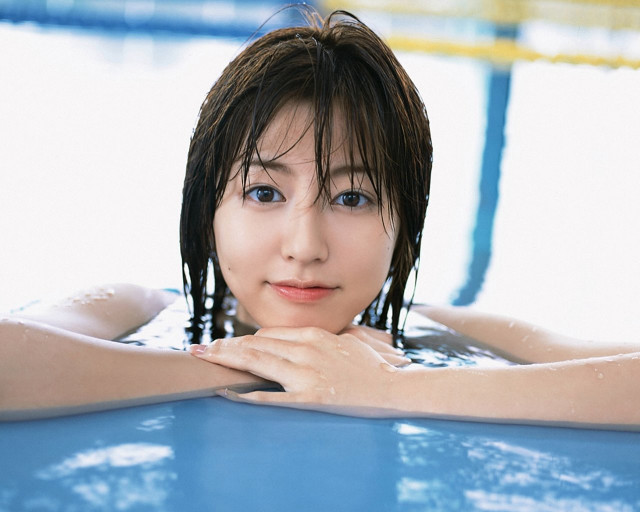Wet hair pool beach portrait free wallpaper - medium preview image