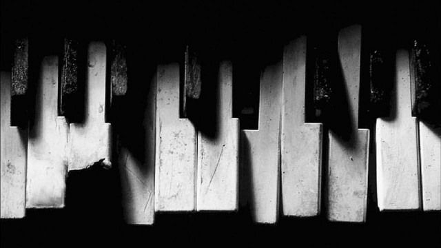 Piano keys shadow hand black free wallpaper - medium preview image