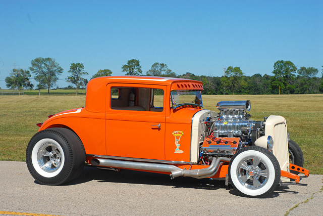 Orange car parked road engine free wallpaper - medium preview image