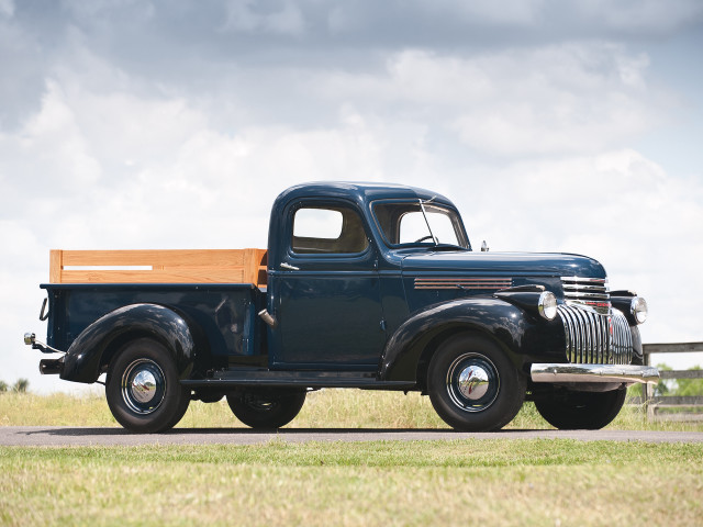 Blue truck parked road grass free wallpaper - medium preview image
